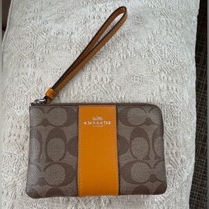 Coach Corner Zip Wristlet In Signature Canvas